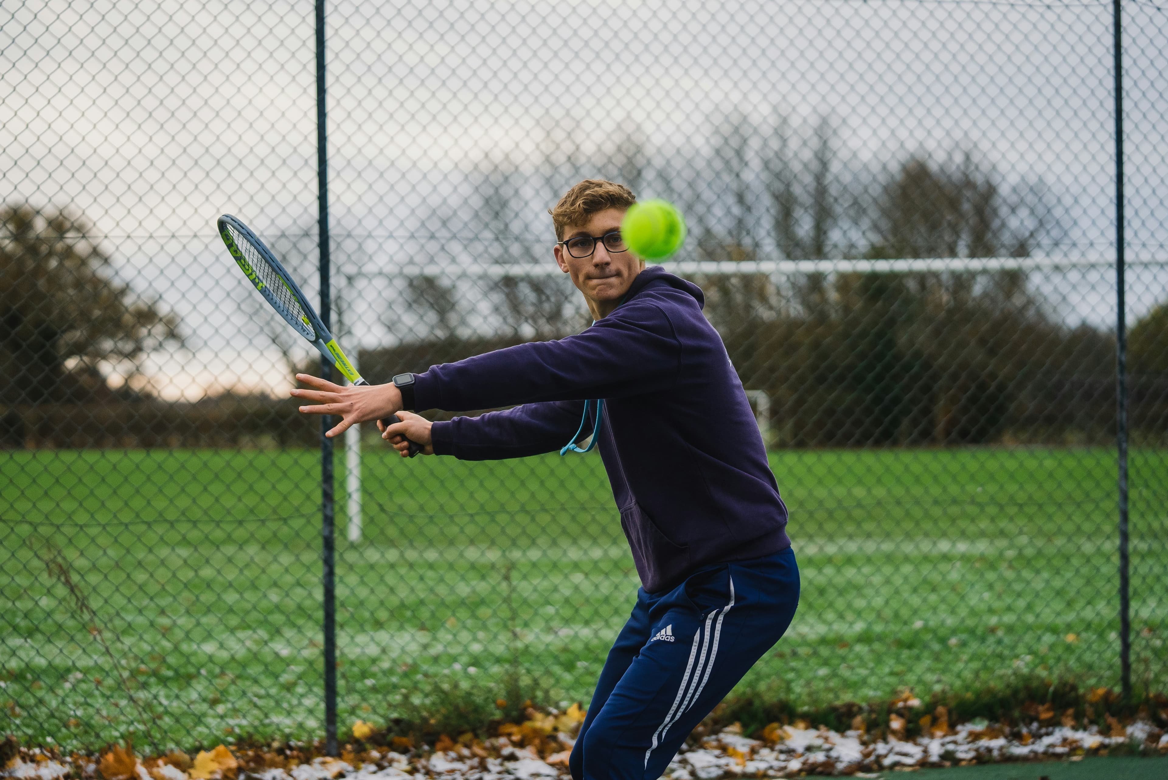 Person going for a serve